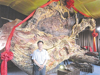 全国首件《清明上河图》全图巨型整块原木根雕问世